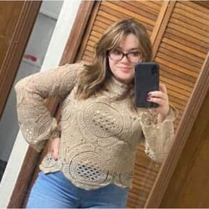 Size L. Tan lace top